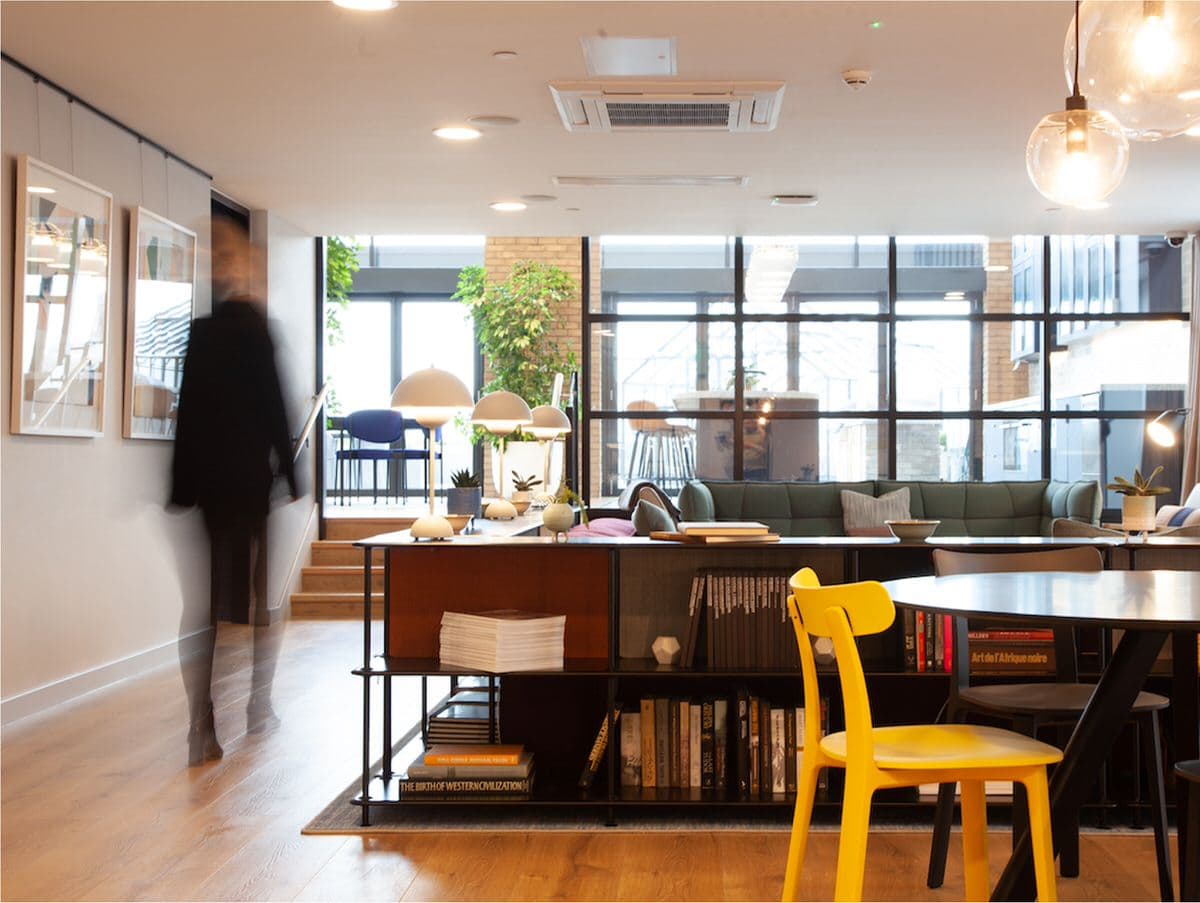 Explore modern Scandinavian style interiors with colorful decor and Danish design elements for a warm, minimal aesthetic.